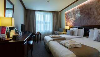 Отель Platinum Hotel and Casino Bansko Банско Стандартный двухместный номер с 2 отдельными кроватями и полупансионом-10
